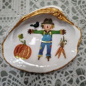 Decorative Shell with Scarecrow Design